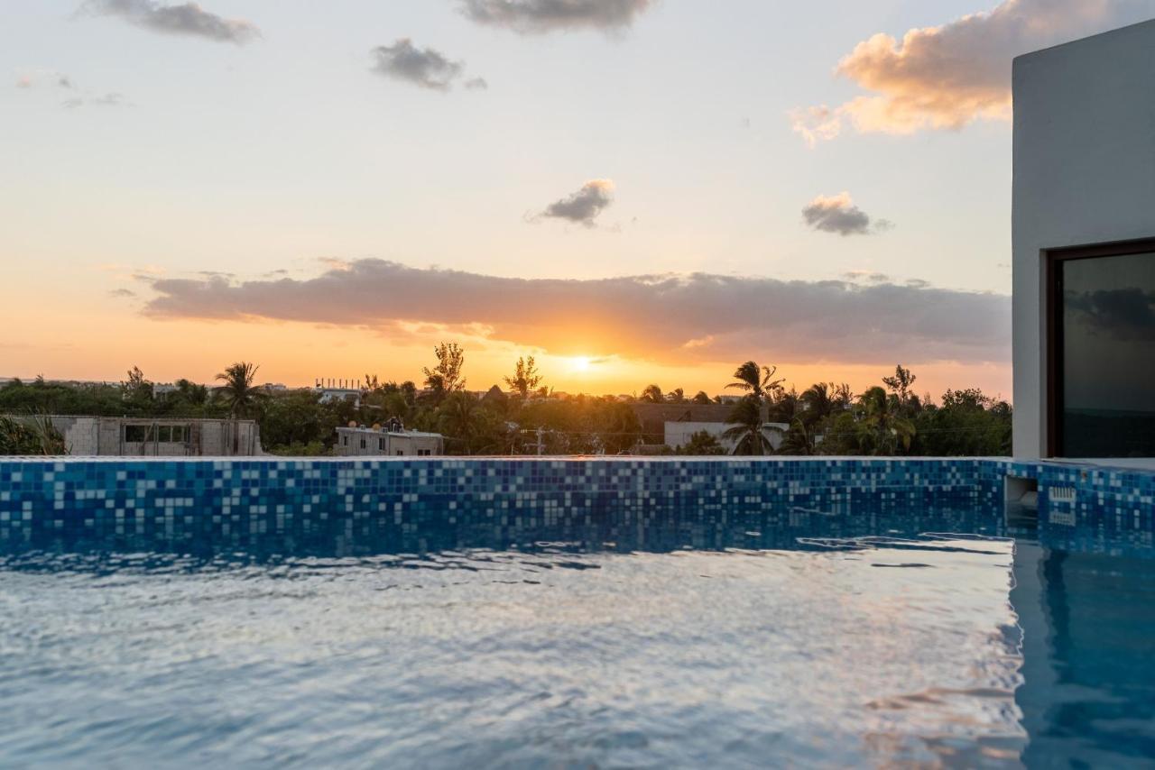 Hotel Mayari Holbox 外观 照片 Sunset at the rooftop pool