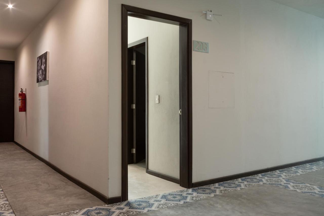 Hotel Mayari Holbox 外观 照片 A door opening