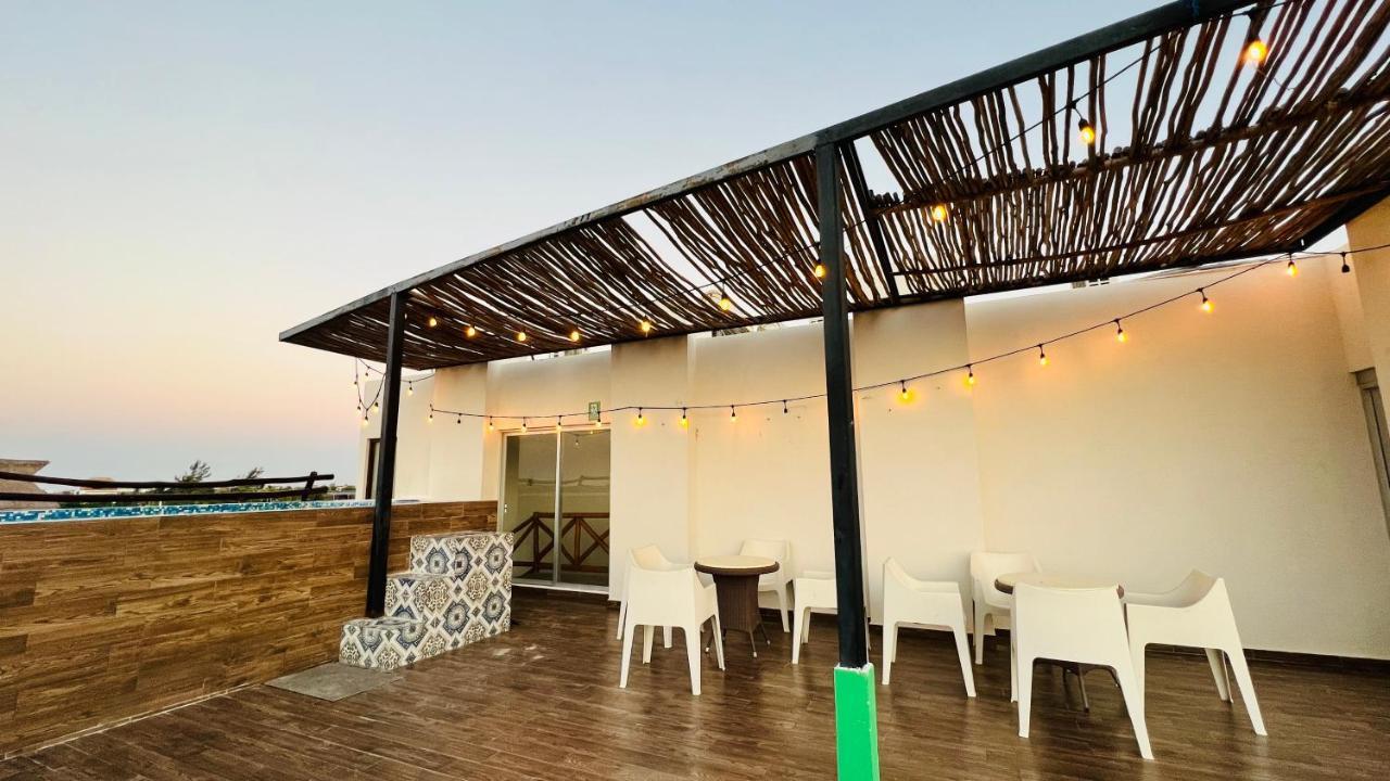 Hotel Mayari Holbox 外观 照片 Rooftop bar at the hotel