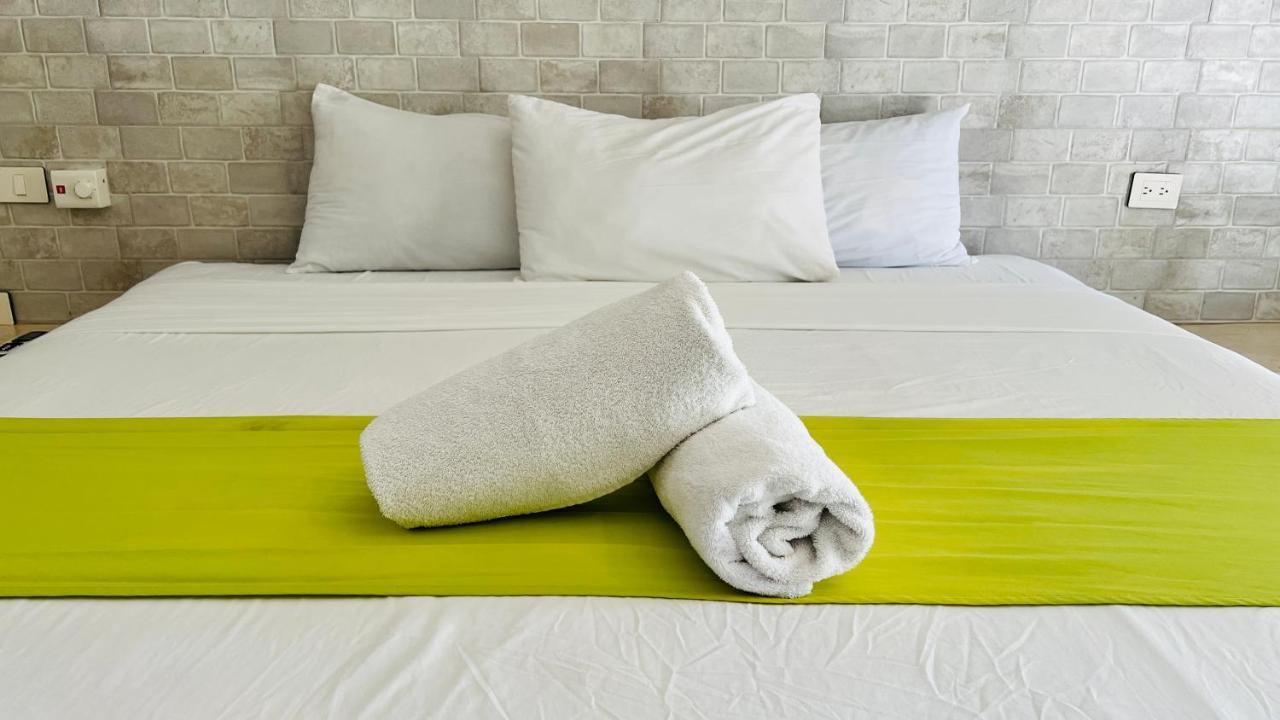 Hotel Mayari Holbox 外观 照片 Bath towels on a bed